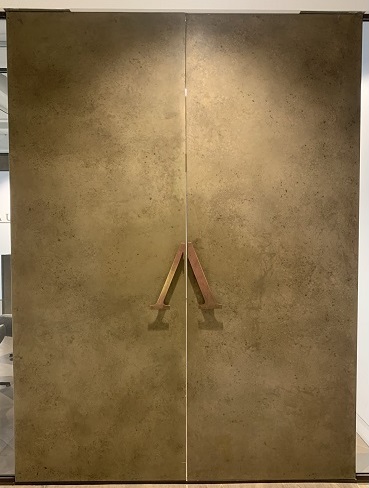 A new Office entrance doors in heavy patinated brass